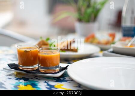 Shrimp shooters cocktails served in fancy hotel bar with green salad appetizers. Stock Photo