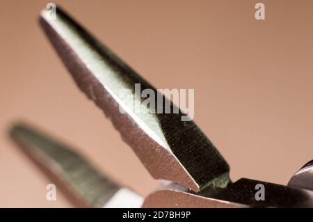 elements small foldable steel multitool, close up, macro Stock Photo