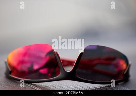 Polarizing sunglasses on a car deck Stock Photo