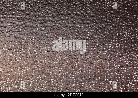 Drops of water on stainless steel close-up Stock Photo