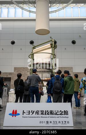 Nagoya / Japan Nov 26 2019 : Tourists are visiting ancient weaving machines in the Memorial Museum of Industry and Technology Toyota is a popular tour Stock Photo