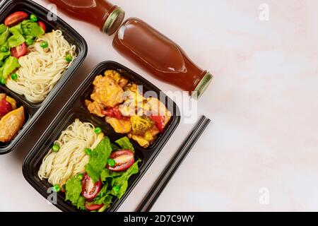 Healthy food delivery or take away lunch in plastic container. Catering services industry.. Stock Photo