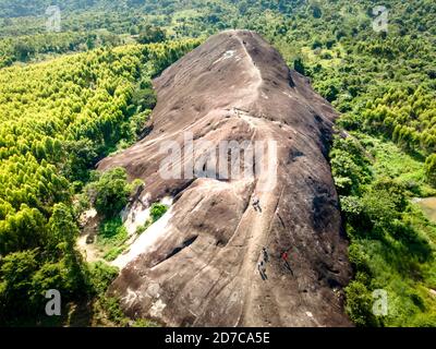 Mother Elephant Stone in Chu Yang Sin mountain range, Dak Lak province, Vietnam-September 6, 2020: Tourists visit a giant rock shaped like an elephant Stock Photo