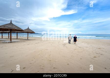 Bai Dai Beach in Cam Ranh District, Khanh Hoa Province, Vietnam - October 7, 2020: Beautiful happy elderly couple rest at tropical resorton the famous Stock Photo