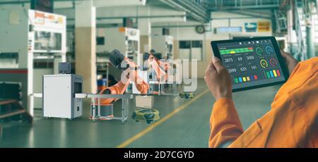 smart factory which use futuristic technology which combine big data, iot, 5g, machine deep learning, automation robot, augmented mixed virtual realit Stock Photo