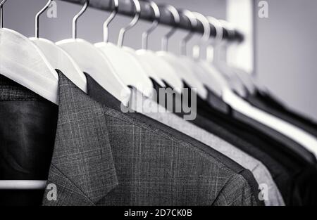 Shirts on hangers. men's suit Stock Photo by ©vtmila 125029620