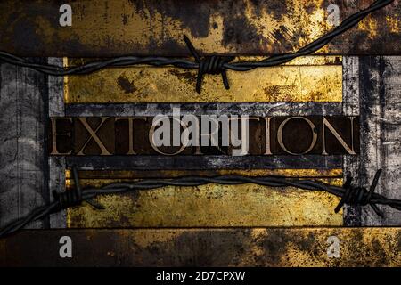 Extortion text message on textured grunge copper and vintage gold background lined with barbed wire Stock Photo