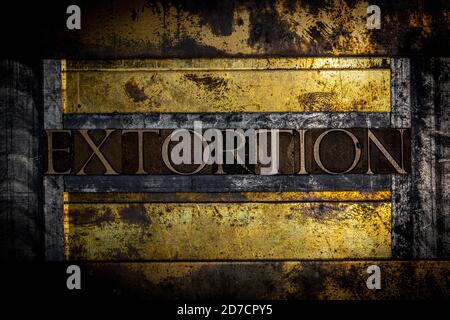 Extortion text message on textured grunge copper and vintage gold background Stock Photo