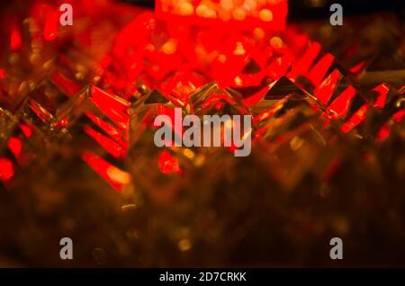Close up of crystal facets in mysterious ruby light. Stock Photo