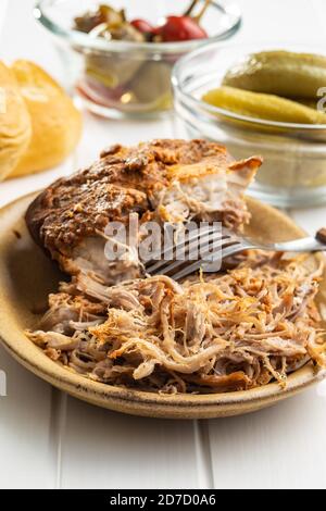 Pulled pork meat on plate. Stock Photo