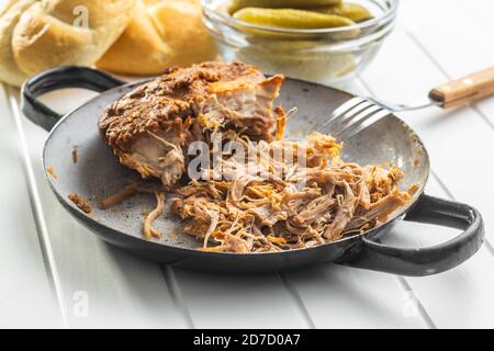 Pulled pork meat on pan. Stock Photo