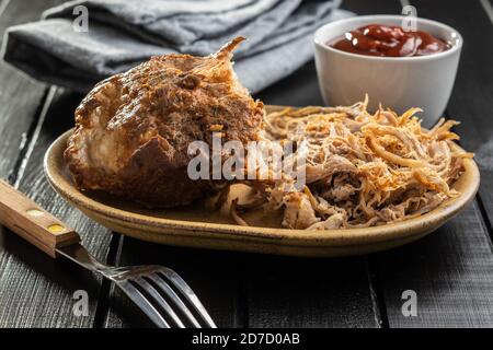 Pulled pork meat on plate. Stock Photo