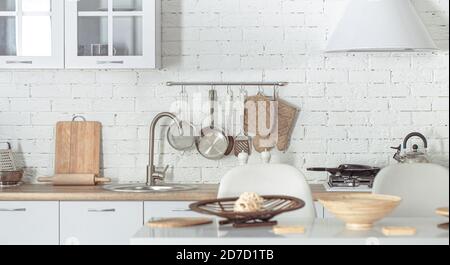 https://l450v.alamy.com/450v/2d7d1tb/modern-stylish-scandinavian-kitchen-interior-with-kitchen-accessories-bright-white-kitchen-with-household-items-2d7d1tb.jpg