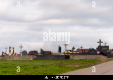 Blurry Culture and religion. Indigenous cemetery. Ancient aboriginal graveyard in the desert under a stormy sky. Stock Photo