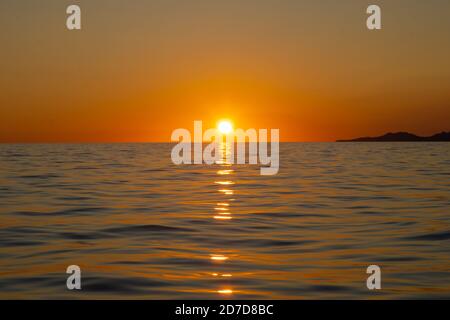 Sunset from a sailboat at Cyclades,Greece Stock Photo