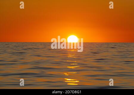 Sunset from a sailboat at Cyclades,Greece Stock Photo