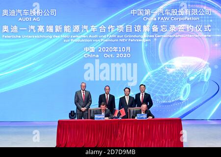 London, UK. 22nd Oct, 2020. China's leading automaker First Automotive Works (FAW) and German automaker Audi sign a memorandum of understanding on the establishment of a joint venture for production of electric vehicles based on the PPE platform in Changchun, northeast China's Jilin Province, Oct. 13, 2020. Credit: Xinhua/Alamy Live News Stock Photo