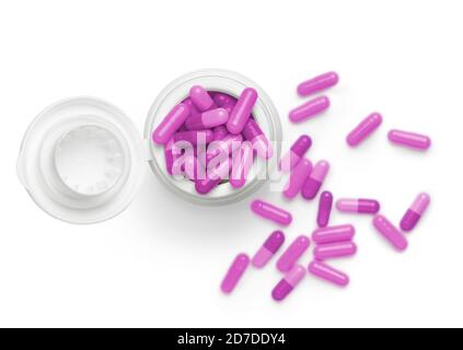 Top view of tube of pink color heap of pills against white background. Focus on top of pot and soft focus on background to give depth to the image. Stock Photo