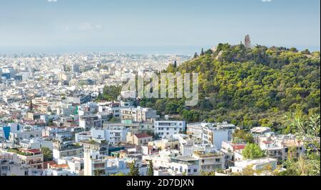 View of Athens and the Hill of the Muses (Philopappos Hill) in horizontal format Stock Photo
