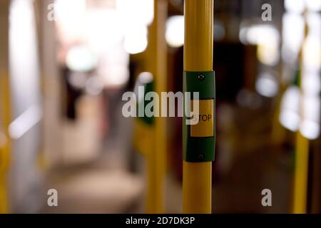 21 October 2020, Berlin: The stop button in the new BVG biplane. Bus of the type 'Alexander Dennis Enviro500' is parked at the BVG bus depot Müllerstraße. The Berlin public transport company is presenting two new BVG double-decker buses. The bus has room for 112 passengers, is 2.55 metres wide and 4.06 metres high. From mid-November, the vehicles are scheduled to run on Line 100. Photo: Kira Hofmann/dpa-Zentralbild/ZB Stock Photo