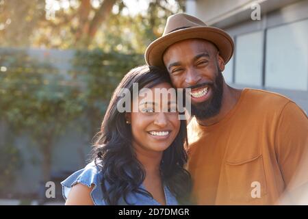 Portrait Of Smiling African American Couple Outdoors In Garden At Home Stock Photo