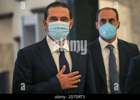 Baabda, Lebanon. 22nd Oct, 2020. Saad Hariri (L) arrives at the Baabda Presidential Palace to be renamed as Lebanon's Prime Minister. Credit: Marwan Naamani/dpa/Alamy Live News Stock Photo