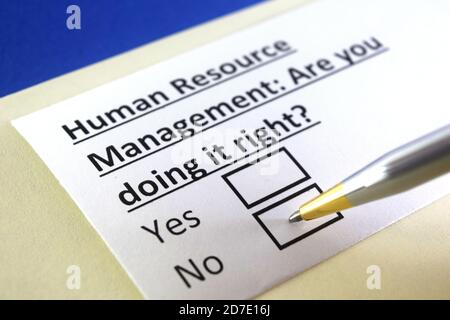 One person is answering question about human resource management. Stock Photo