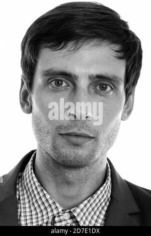 Face of young handsome businessman in suit Stock Photo