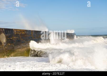 Waves hitting the breakwater at Newhaven during a storm. Stock Photo