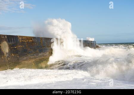 Waves hitting the breakwater at Newhaven during a storm. Stock Photo