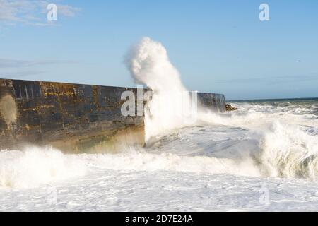 Waves hitting the breakwater at Newhaven during a storm. Stock Photo