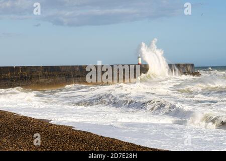 Waves hitting the breakwater at Newhaven during a storm. Stock Photo