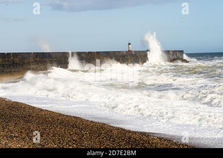 Waves hitting the breakwater at Newhaven during a storm. Stock Photo