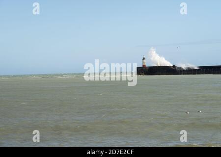 Waves hitting the breakwater at Newhaven during a storm. Stock Photo