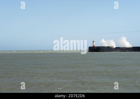 Waves hitting the breakwater at Newhaven during a storm. Stock Photo