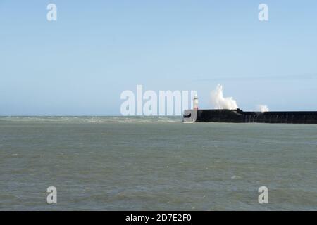 Waves hitting the breakwater at Newhaven during a storm. Stock Photo