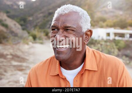 Portrait Of Smiling African American Senior Man Outdoors In Countryside Stock Photo