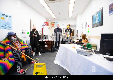 EDITORIAL USE ONLY (Left to right) Eek the Clown, Gail Porter, Suggs, Mike Spearman and Stuart Semple have interviews with Basil Brush at artist Stuart Semple's new art installation entitled the 'Artist Job Centre' in Neal Street, London. Stock Photo