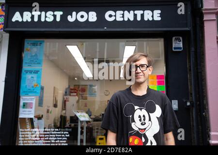 EDITORIAL USE ONLY Artist Stuart Semple unveils a new art installation entitled the 'Artist Job Centre' in Neal Street, London. Stock Photo