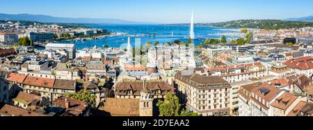 Panoramic view over the rooftops of Geneva, the bay of Geneva and the Lake Geneva from the bell tower of Saint-Pierre cathedral on a sunny summer day. Stock Photo