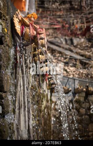 Nepal. 108 water spouts from Muktinath hindu and buddhist holy temple. Annapurna circuit. Stock Photo