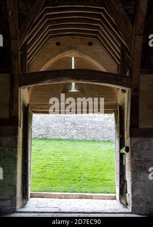 The Tithe Barn on Pound Lane, medieval stone barn in the Barton Grange complex on the River Avon in Bradford on Avon in the Cotwolds, Wiltshire, UK Stock Photo