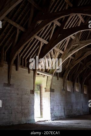 The Tithe Barn on Pound Lane, medieval stone barn in the Barton Grange complex on the River Avon in Bradford on Avon in the Cotwolds, Wiltshire, UK Stock Photo