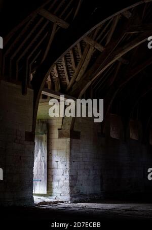 The Tithe Barn on Pound Lane, medieval stone barn in the Barton Grange complex on the River Avon in Bradford on Avon in the Cotwolds, Wiltshire, UK Stock Photo