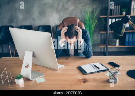 Portrait of his he nice handsome devastated depressed man feeling bad symptom pain crisis psychology tense burnout burn out sorrow at modern Stock Photo