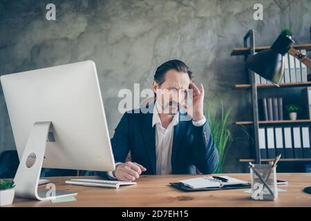 Portrait of his he nice handsome depressed man feeling dizzy bad chronic disease symptom pain virus middle age health care at modern industrial Stock Photo