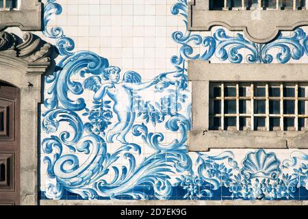 Detail of Carmo church in Porto. Outside there is a magnificent panel of blue and white tiles. Stock Photo