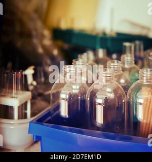Empty flasks and bottles in the laboratory, close-up Stock Photo