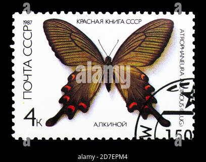MOSCOW, RUSSIA - MARCH 31, 2018: A stamp printed in USSR (Russia) shows Chinese Windmill (Atrophaneura alcinous), Butterflies serie, circa 1987 Stock Photo