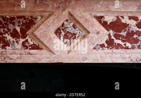 Contrasting colours of marble on fire surround with copy space Stock Photo